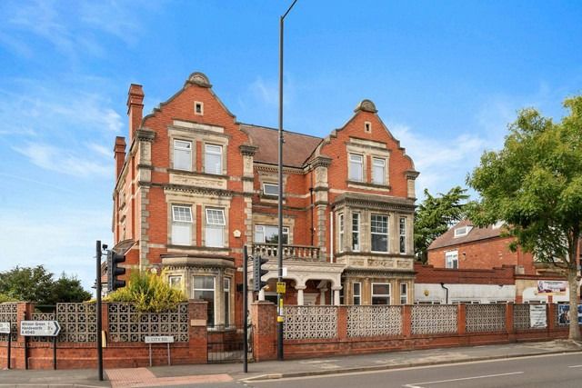 Temple Row House, a red-brick Victorian building with stone gables, on City Road in Birmingham